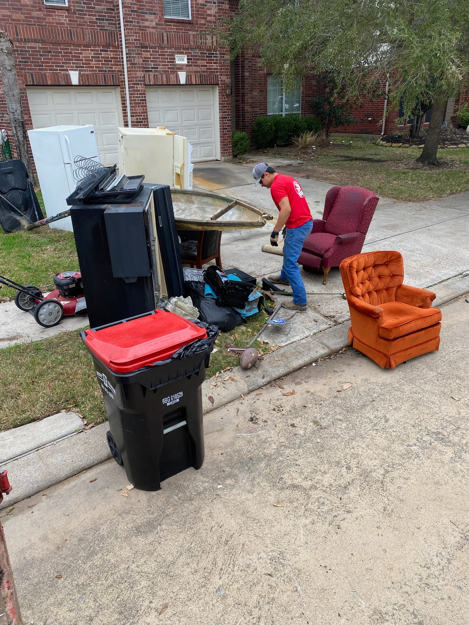 Freedom Hauling Team removing furniture in Sugar Land, Tx